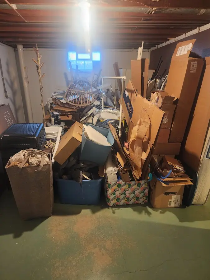 Roll-off dumpster container at job site for 4 Yard Dumpster Rental in Big Rapids